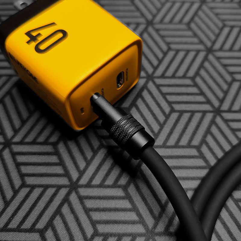 USB-C charging cable connected to a yellow 40W wall adapter