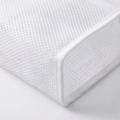Close-up of reinforced flat base on toiletry pouch