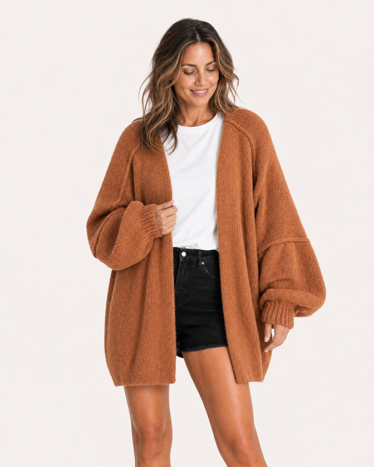 Rust oversized open-front knit cardigan, front view on model